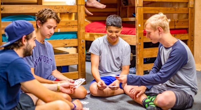 campers playing cards cabin 2