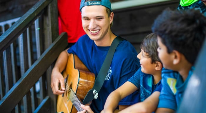 counselor playing guitar